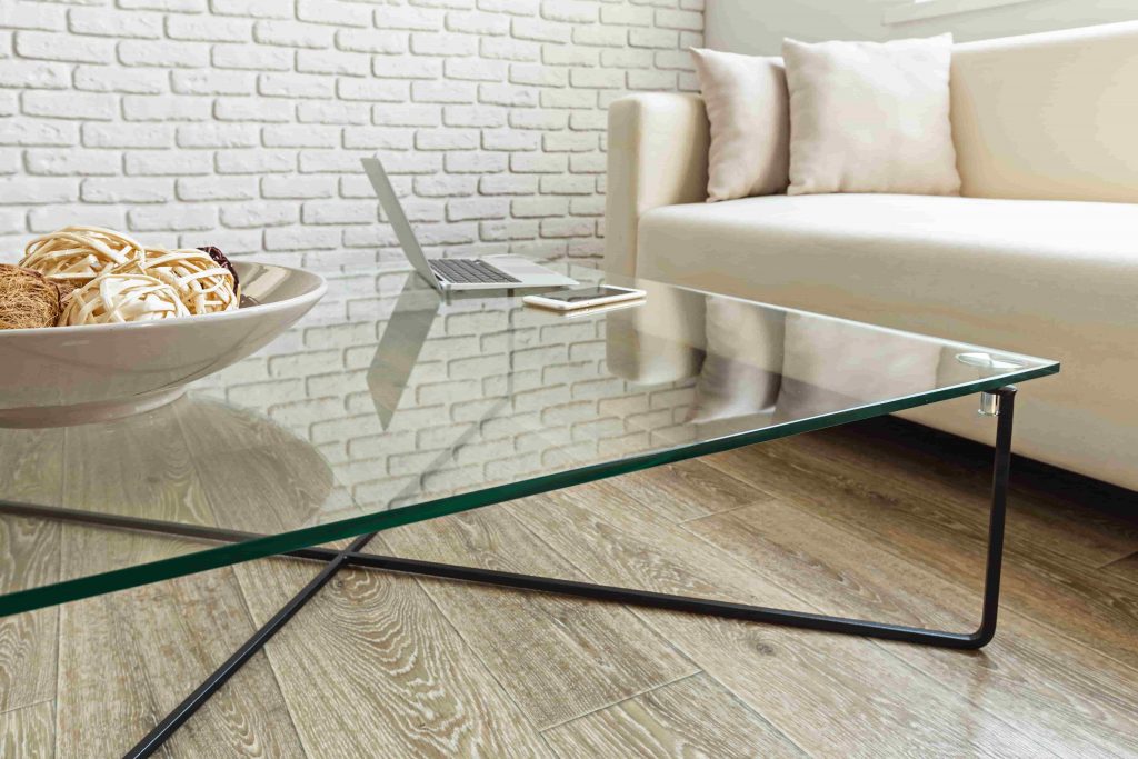 glass table top in modern white living room