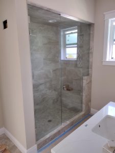 Steam shower door with enclosures.